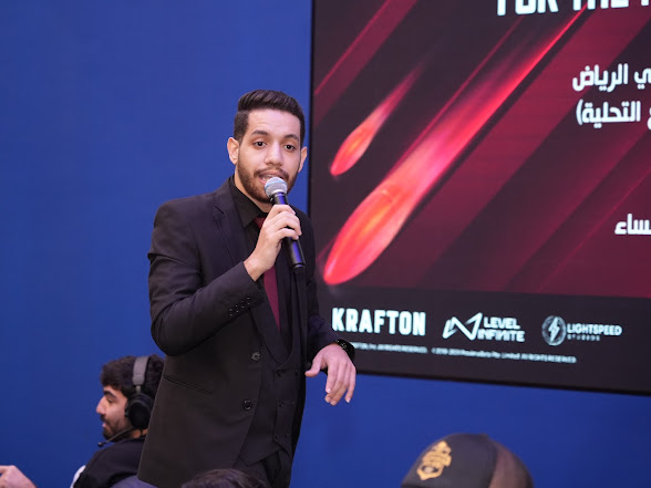 AbdulRahman presenting at a gaming event